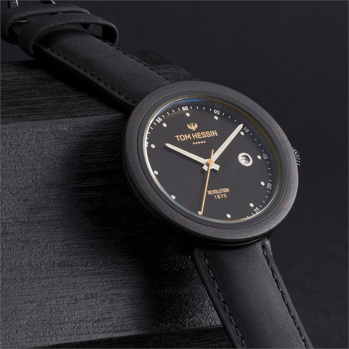 Tom Hessin Revolution Black watch with black leather strap and gold buckle - lifestyle