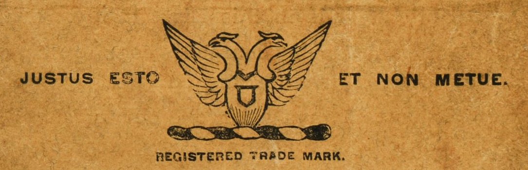 Detail of the 1896 cover: a double-headed eagle over a shield, with the words Justus esto et non metue and Registered Trade Mark